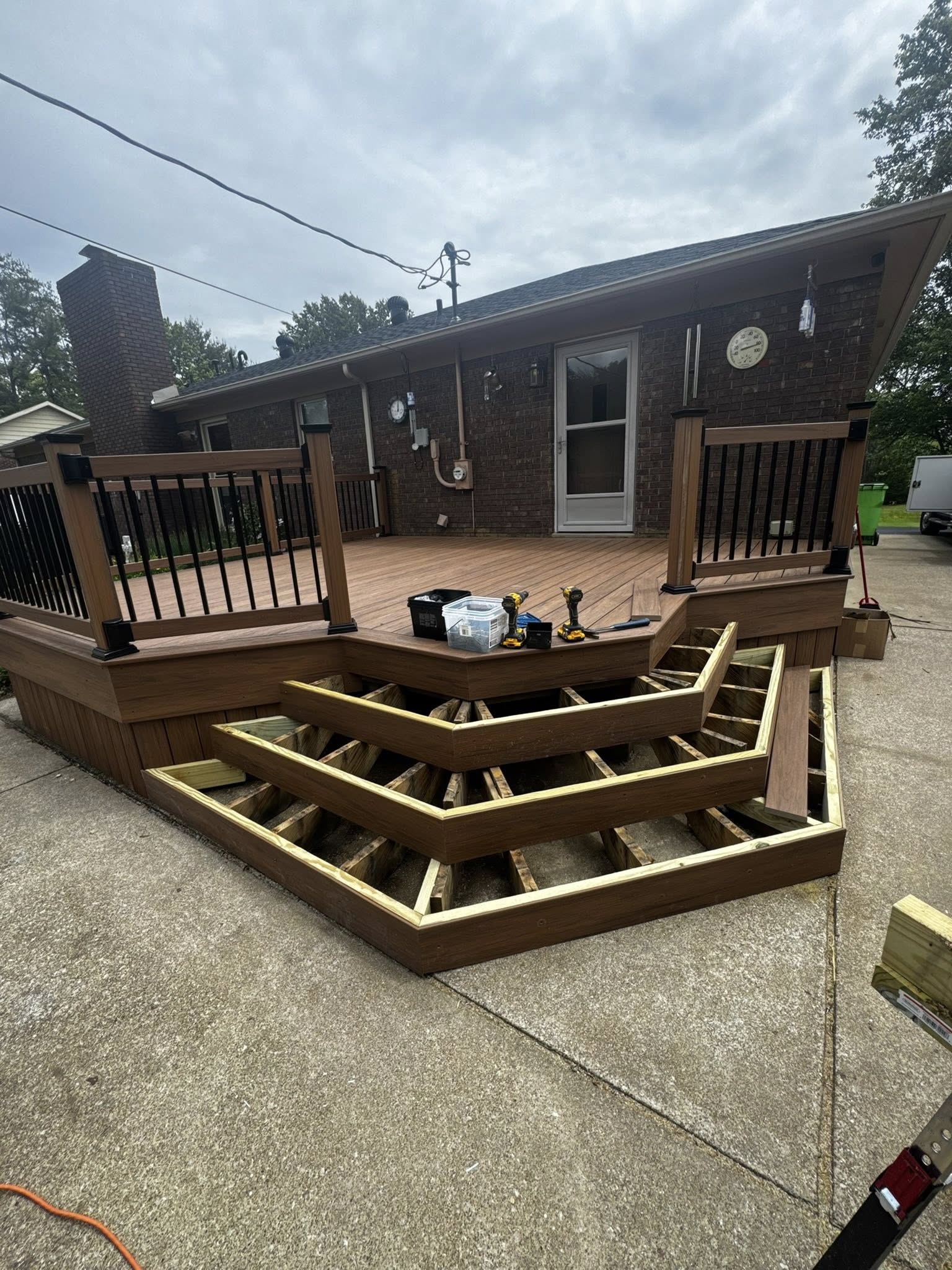 Covered porch soffit and exterior finish work by Rust Builders